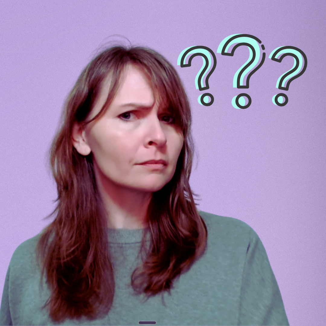 J. L. Friday with a skeptical look on her face covering the section about how community wealth and wellbeing economies work.